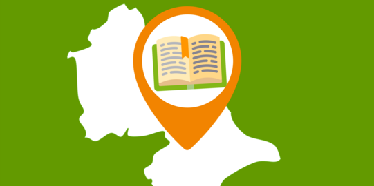 Ausschnitt einer Landkarte, in dem ein aufgeschlagenes Buch zu sehen ist